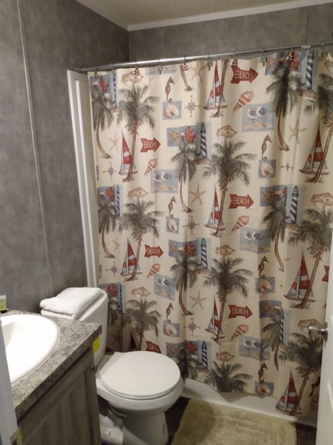 a bathroom at lake point motel